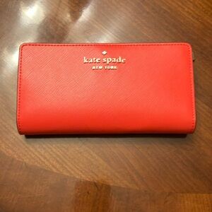 KATE SPADE. MORGAN SLIM BIFOLD WALLET. ORANGE. BRAND NEW. CARD HOLDER. NWOT